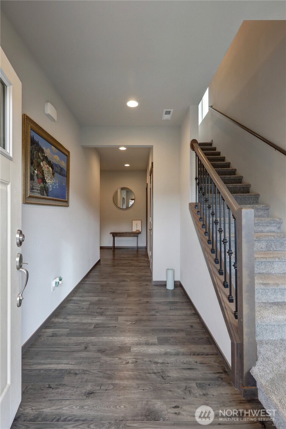 5154 Granger Street Bremerton, WA 98312 - Photo 4 of 26 a view of a hallway with wooden floor