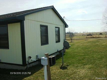 8362 West Sober Road Fowlerville, MI 48836 - Photo 15 of 16 Side