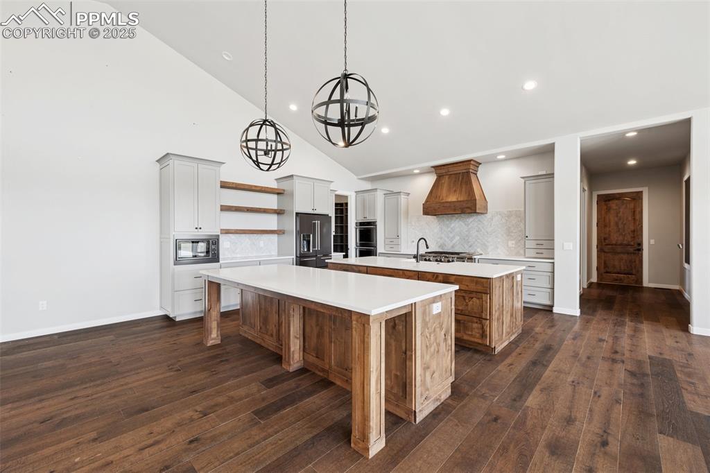 24365 Murphy Road Calhan, CO 80808 - Photo 13 of 48 a kitchen with a sink cabinets and wooden floor