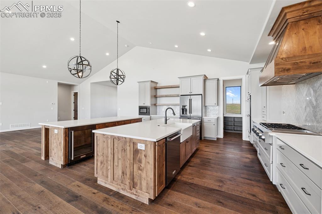 24365 Murphy Road Calhan, CO 80808 - Photo 14 of 48 a kitchen with a stove and a sink