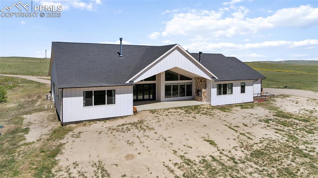 24365 Murphy Road Calhan, CO 80808 - Photo 3 of 48 a front view of a house with a yard