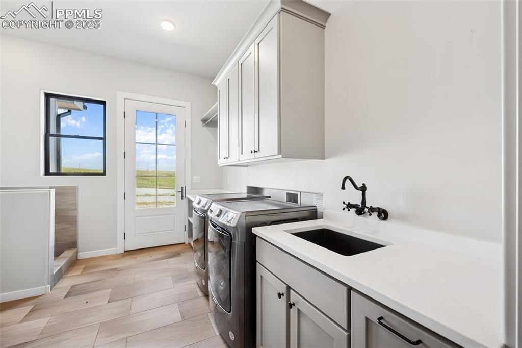 24365 Murphy Road Calhan, CO 80808 - Photo 31 of 48 a view of a kitchen with a sink and cabinets