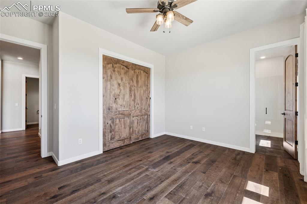 24365 Murphy Road Calhan, CO 80808 - Photo 34 of 48 wooden floor in an empty room with a window