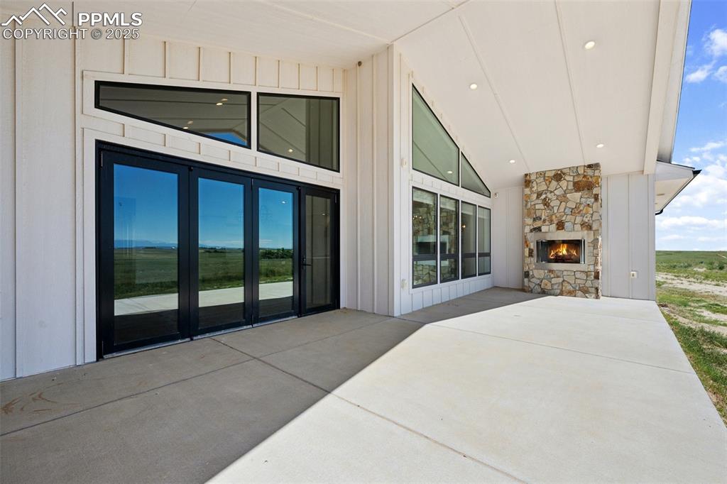24365 Murphy Road Calhan, CO 80808 - Photo 5 of 48 a bedroom with a bed and a large window