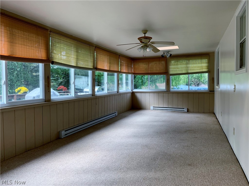 9320 Island Road North Ridgeville, OH 44039 - Photo 32 of 34 heated Florida room extens full length of kitchen and dining room