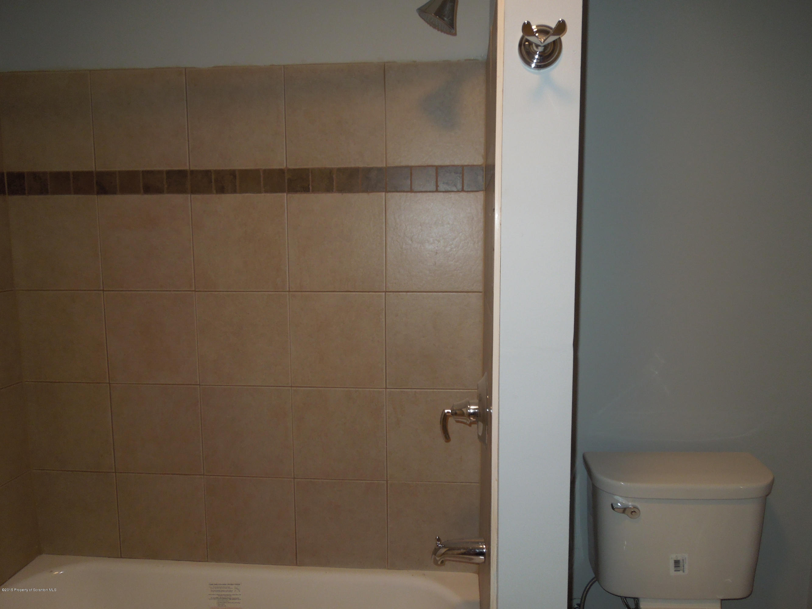 474 Fairview Road Dalton, PA 18414 - Photo 13 of 21 a bathroom with a toilet and a shower