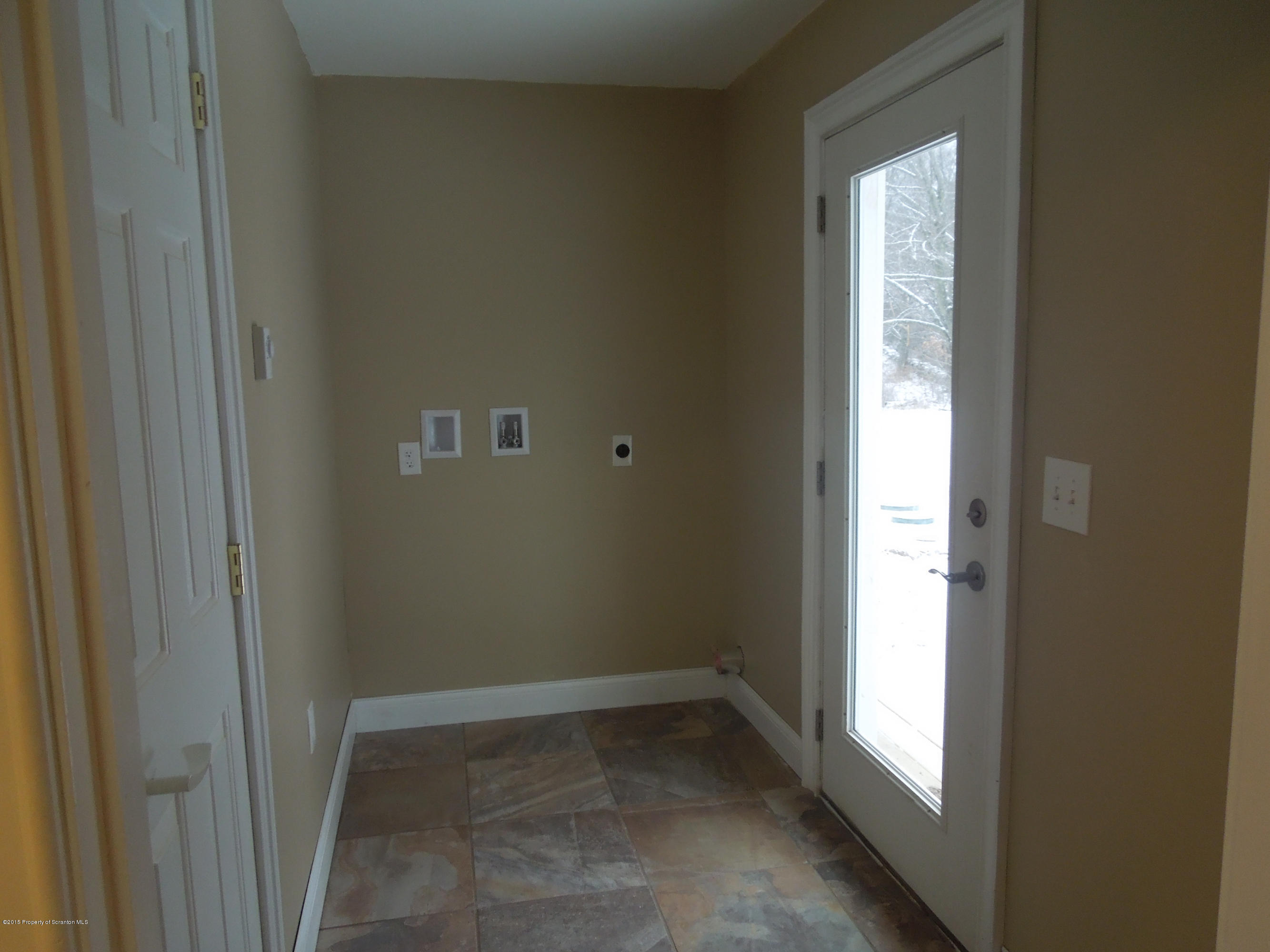 474 Fairview Road Dalton, PA 18414 - Photo 20 of 21 a view of an empty room and a window