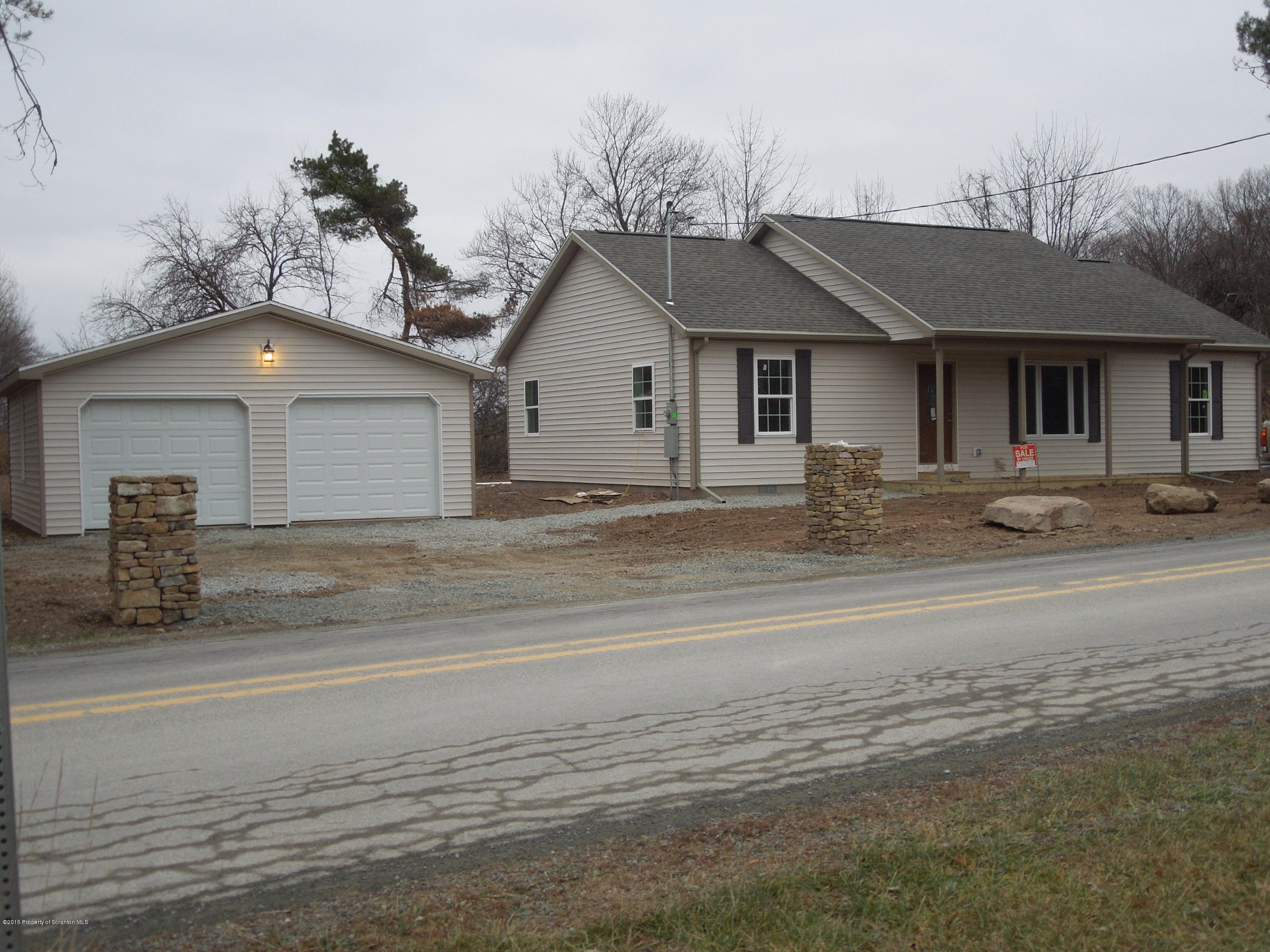 474 Fairview Road Dalton, PA 18414 - Photo 2 of 21 a front view of a house with a outdoor space