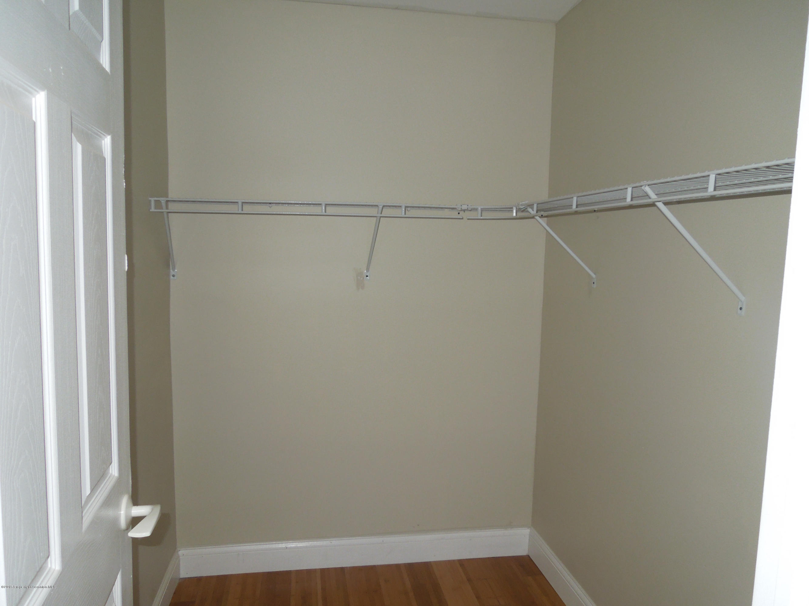 474 Fairview Road Dalton, PA 18414 - Photo 9 of 21 a view of a room with racks on the wall