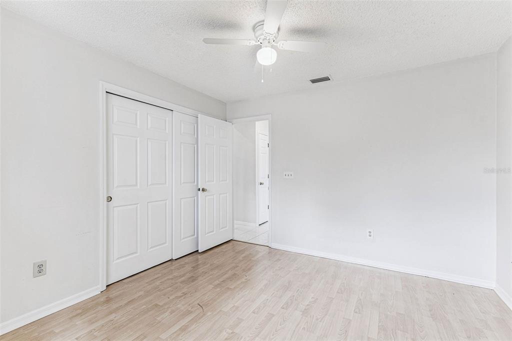 7206 Ridgeport Drive Tampa, FL 33647 - Photo 31 of 78 wooden floor in an empty room