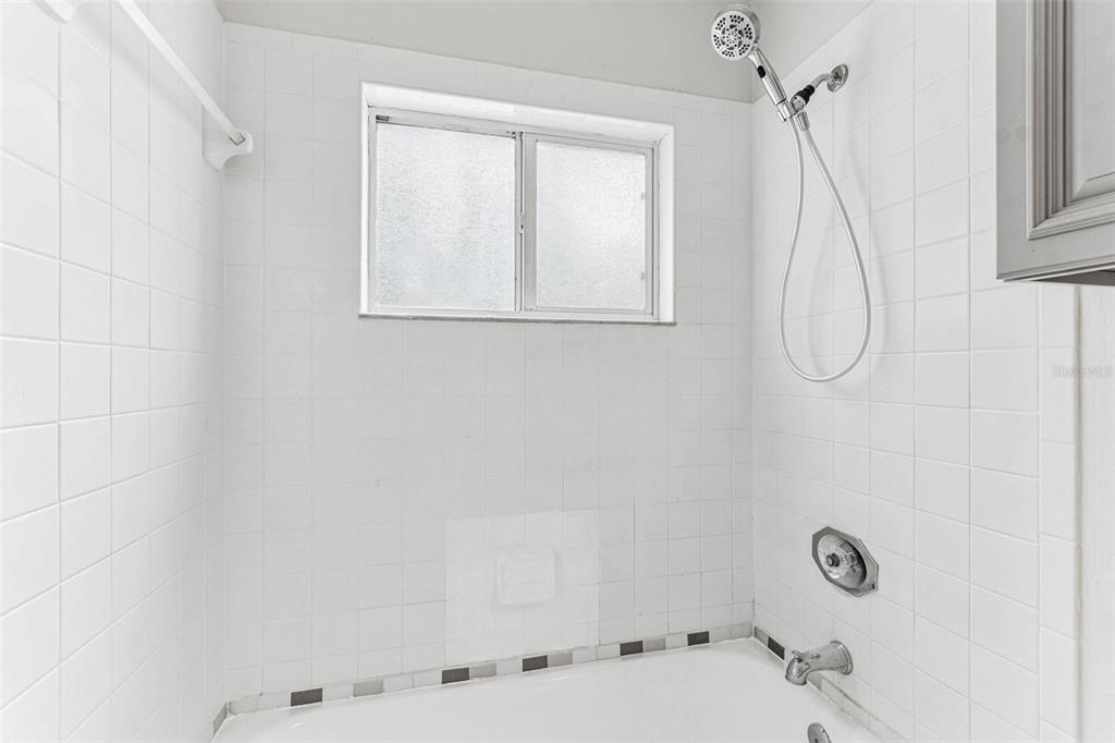 7206 Ridgeport Drive Tampa, FL 33647 - Photo 34 of 78 a bathroom with a bath tub and a shower