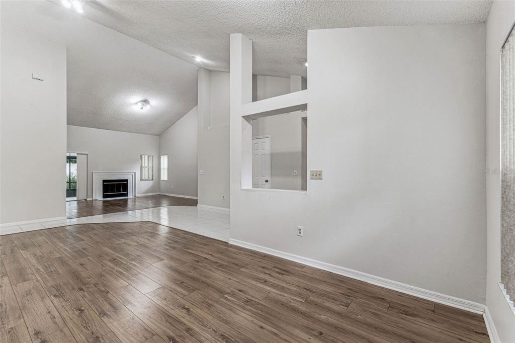 7206 Ridgeport Drive Tampa, FL 33647 - Photo 44 of 78 a view of kitchen and hall with wooden floor