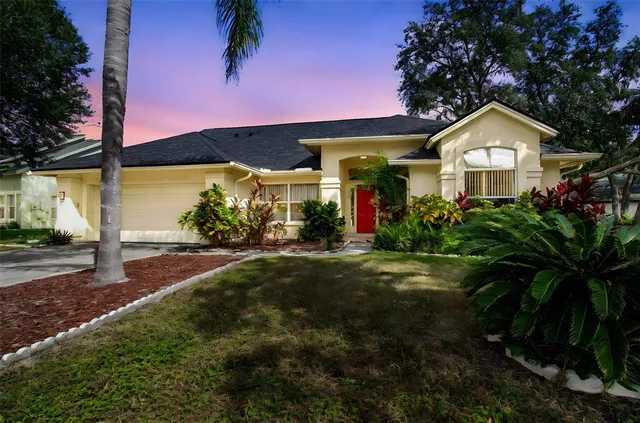 a kitchen with stainless steel appliances granite countertop a stove microwave and sink