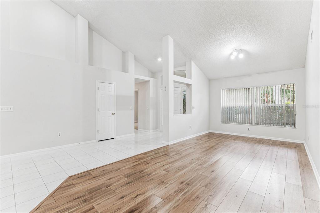 7206 Ridgeport Drive Tampa, FL 33647 - Photo 54 of 78 a view of wooden floor and windows in a room