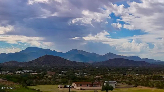 a view of lake with mountain