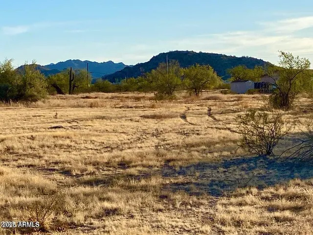 a view of mountain view with mountains in the background