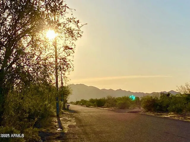 a view of a large body of water and mountain