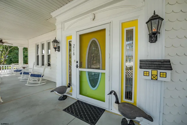 a bedroom with furniture and a fireplace