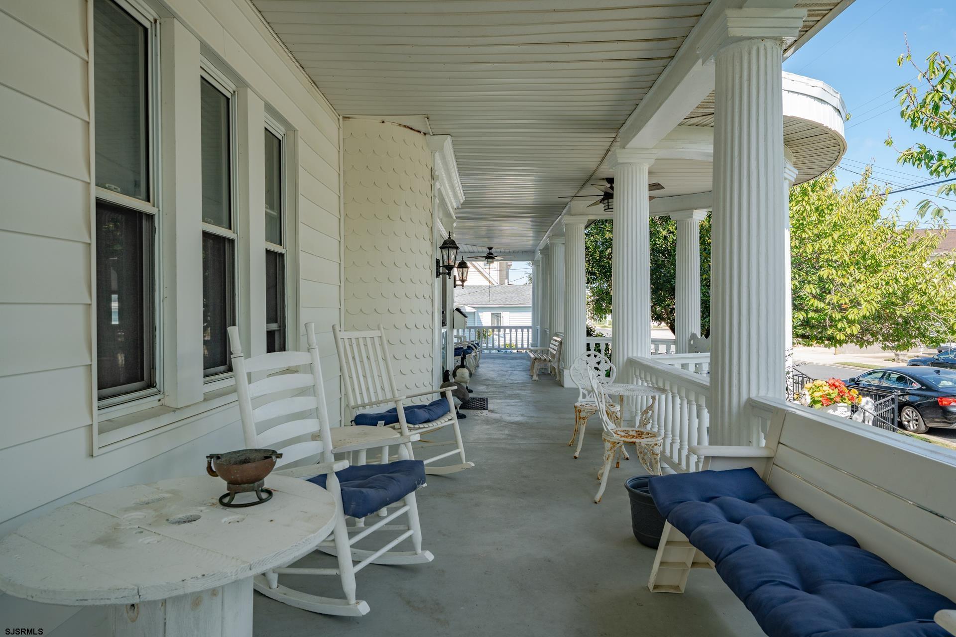 216 East Fern Road Wildwood Crest, NJ 08260 - Photo 19 of 93 a dining room with furniture and wooden floor