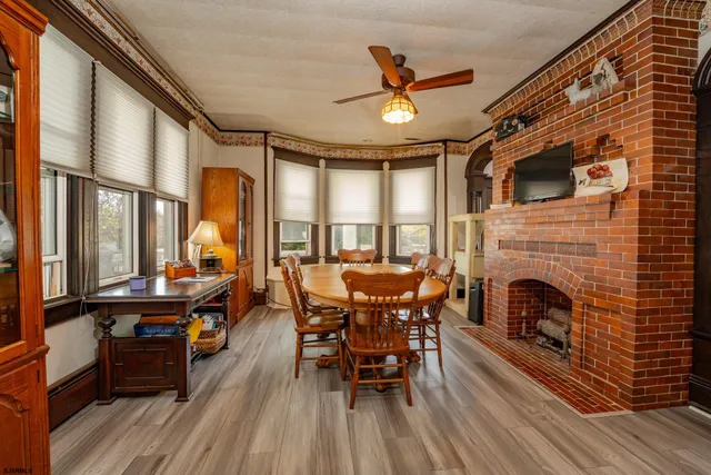 a bedroom with furniture and a window