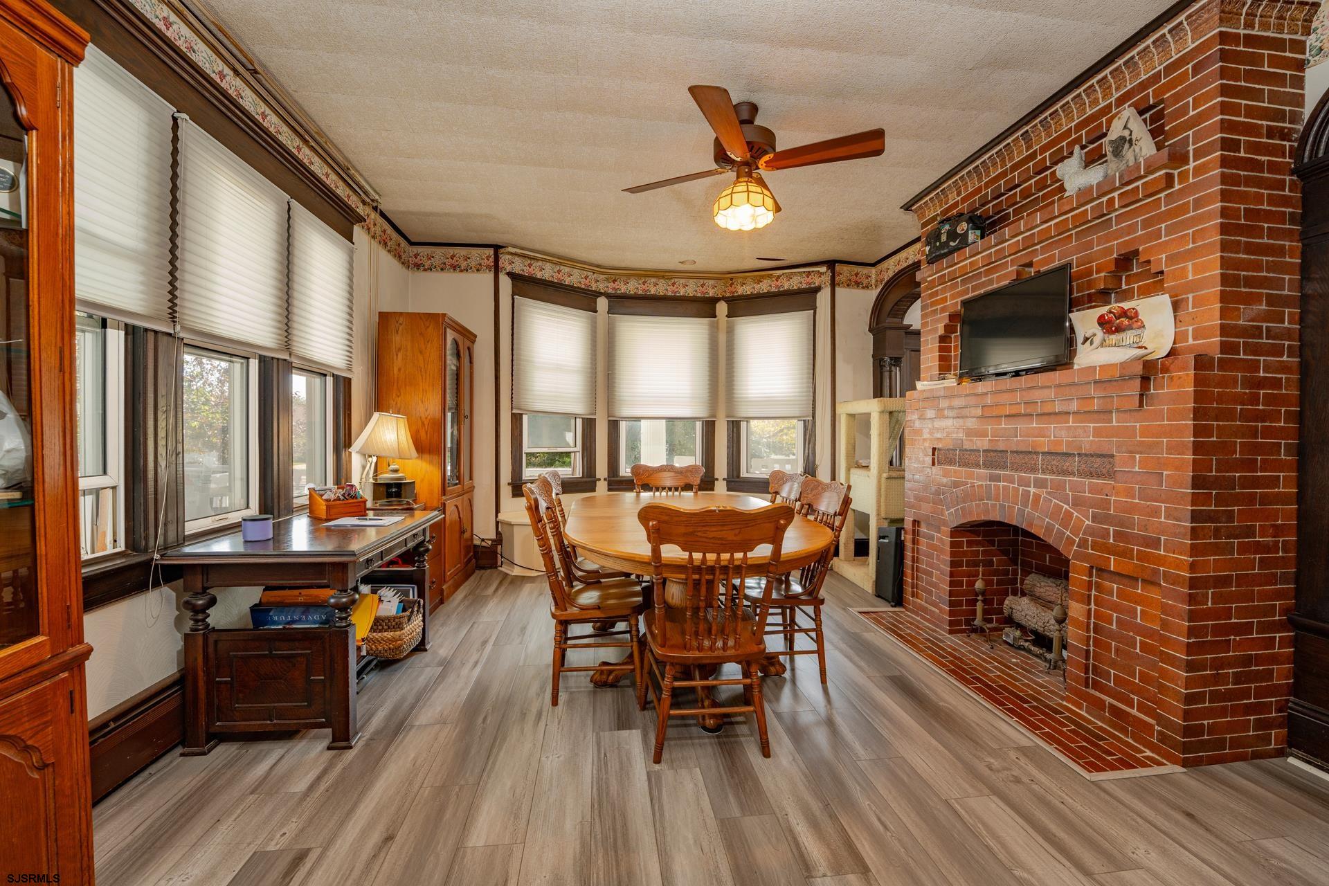 216 East Fern Road Wildwood Crest, NJ 08260 - Photo 25 of 93 a view of a livingroom with furniture window and wooden floor