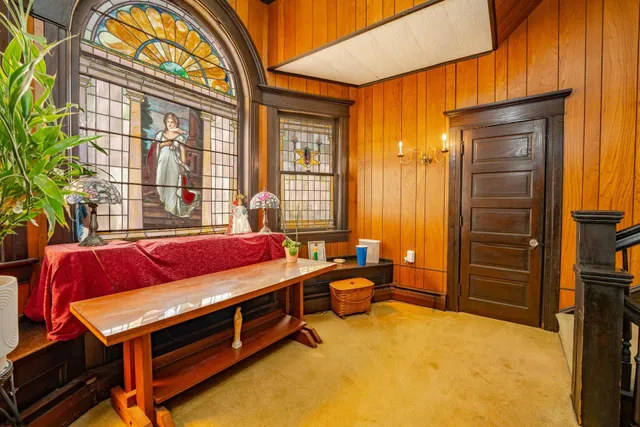 a bathroom with a sink a mirror and a shower curtain