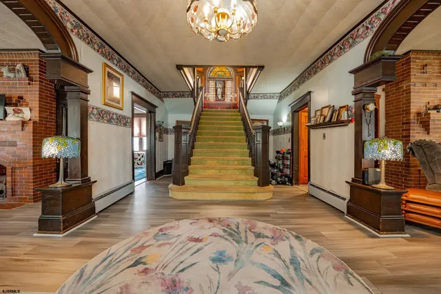 a bathroom with a sink mirror vanity and toilet