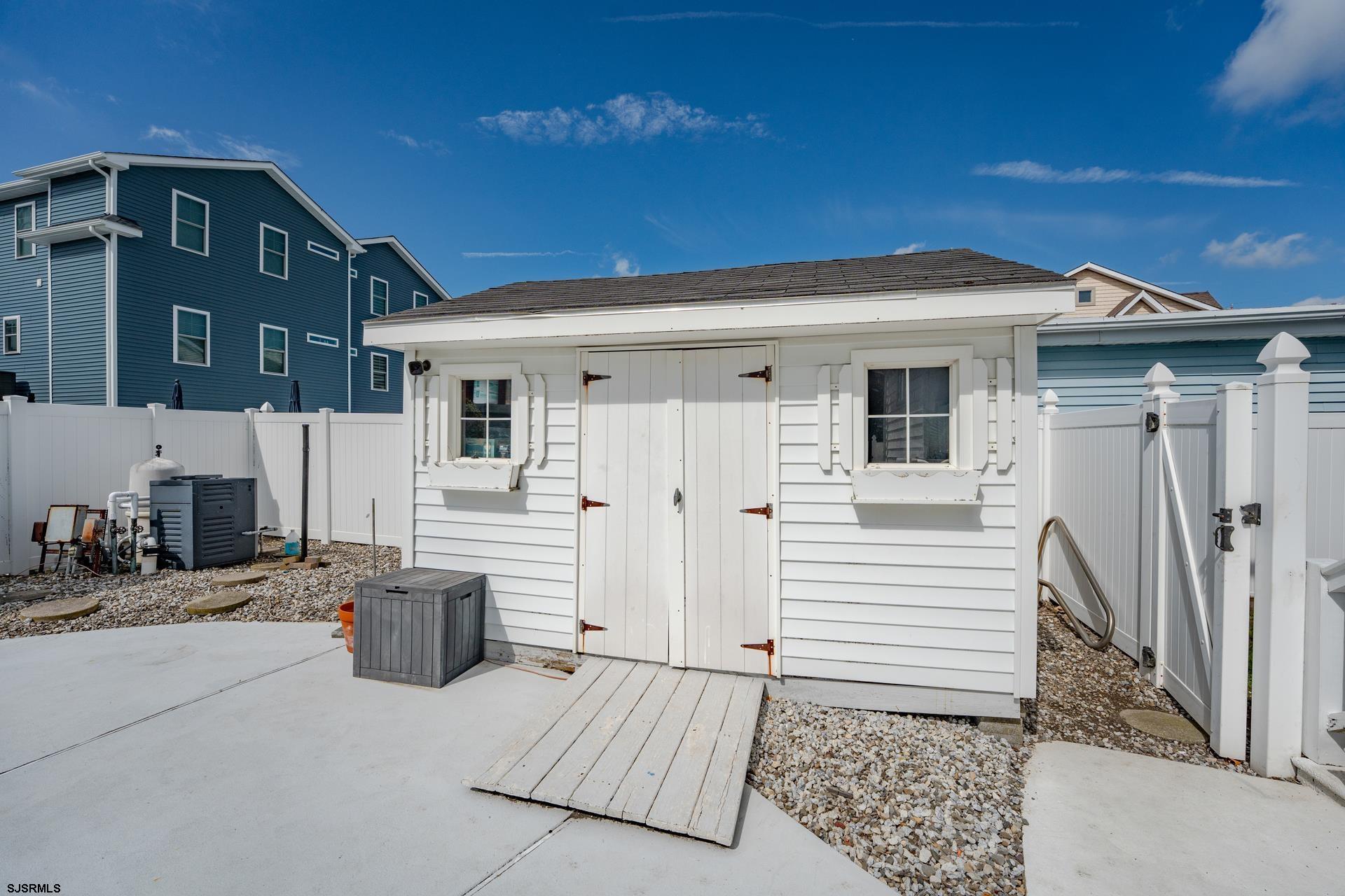 216 East Fern Road Wildwood Crest, NJ 08260 - Photo 70 of 93 a view of a house with a patio