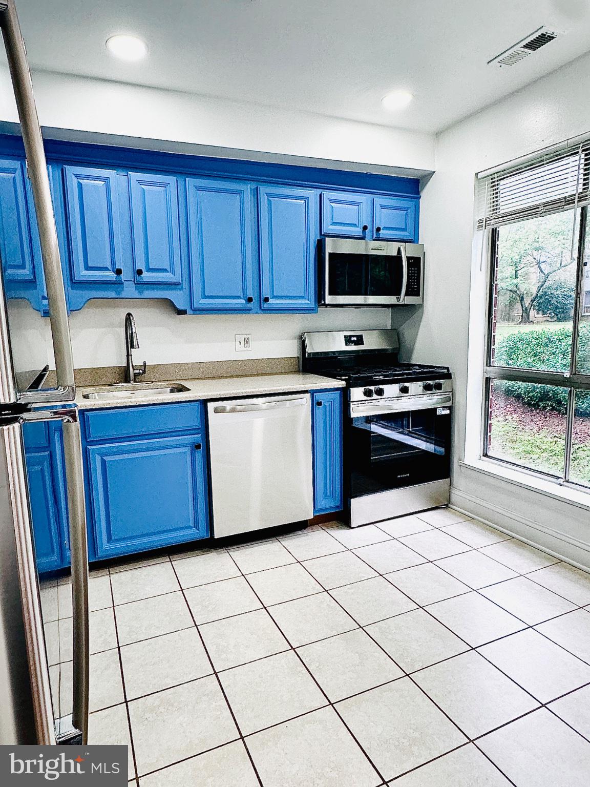 3914 Bel Pre Road, Unit 4 Silver Spring, MD 20906 - Photo 6 of 20 Kitchen with new Stainless Steel Appliances