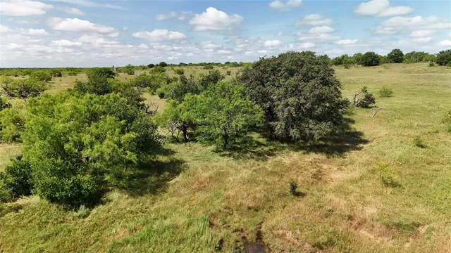 a view of a lake with outdoor space