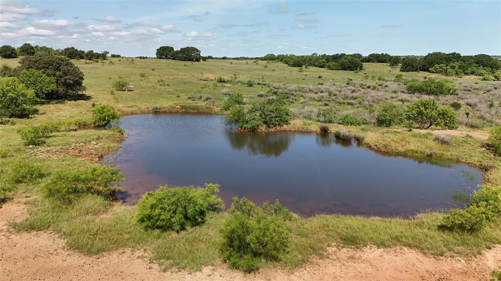0 Ward Road Olney, TX 76374 - Photo 3 of 29 a view of a lake with a yard