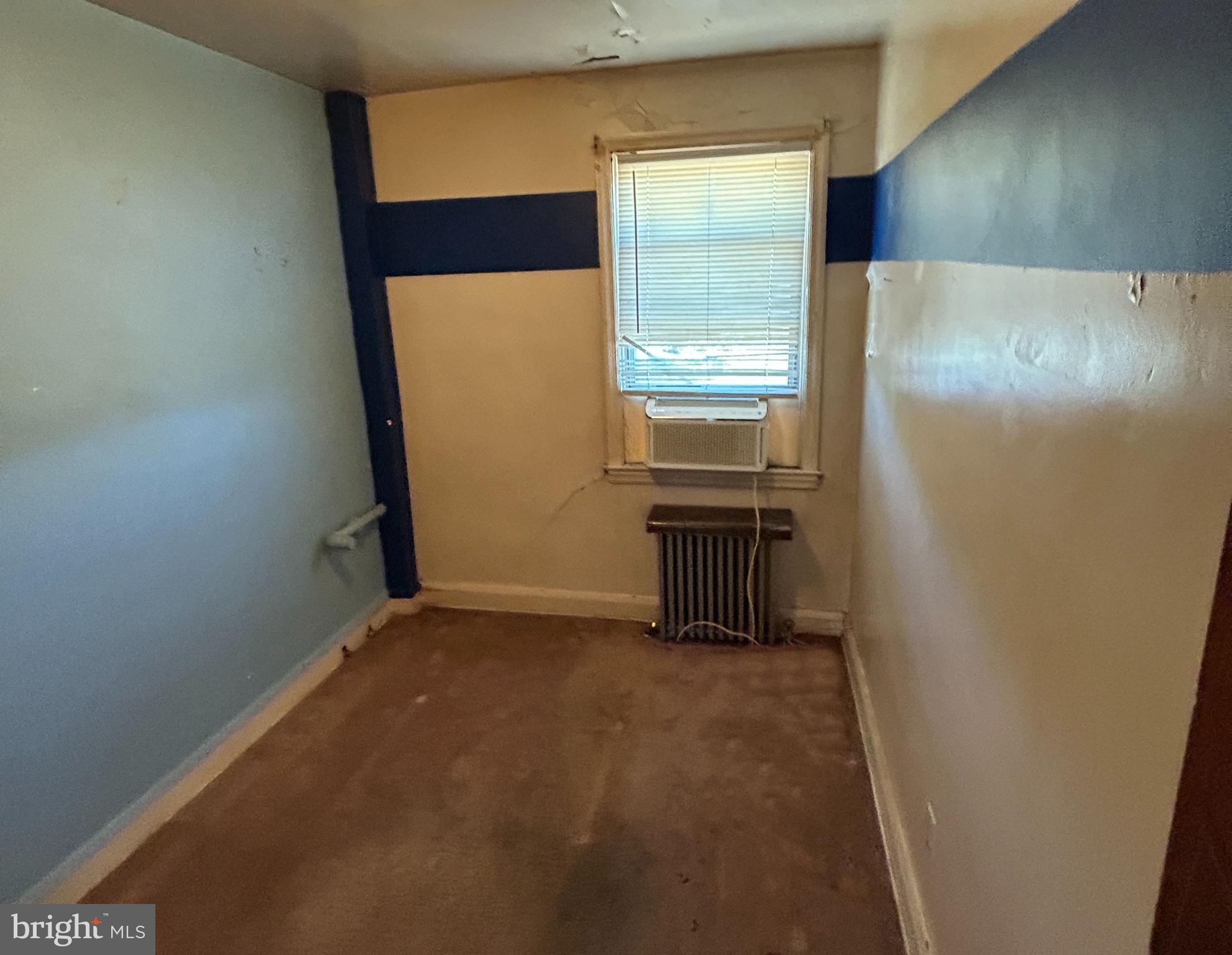 4014 Century Road Baltimore, MD 21206 - Photo 16 of 19 a view of an empty room with a window