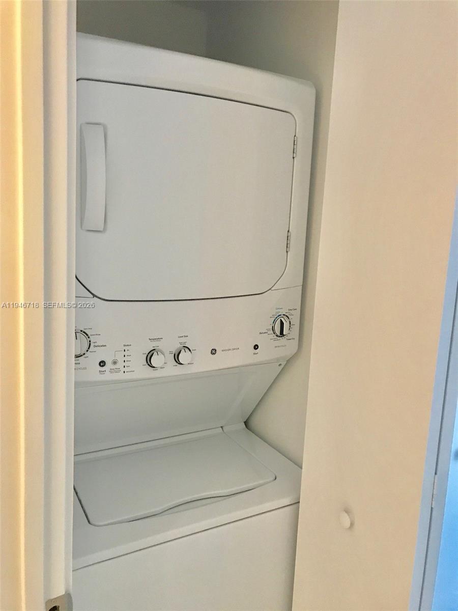 55 Southwest 9th Street, Unit 2807 Miami, FL 33130 - Photo 11 of 20 a utility room with dryer and washer