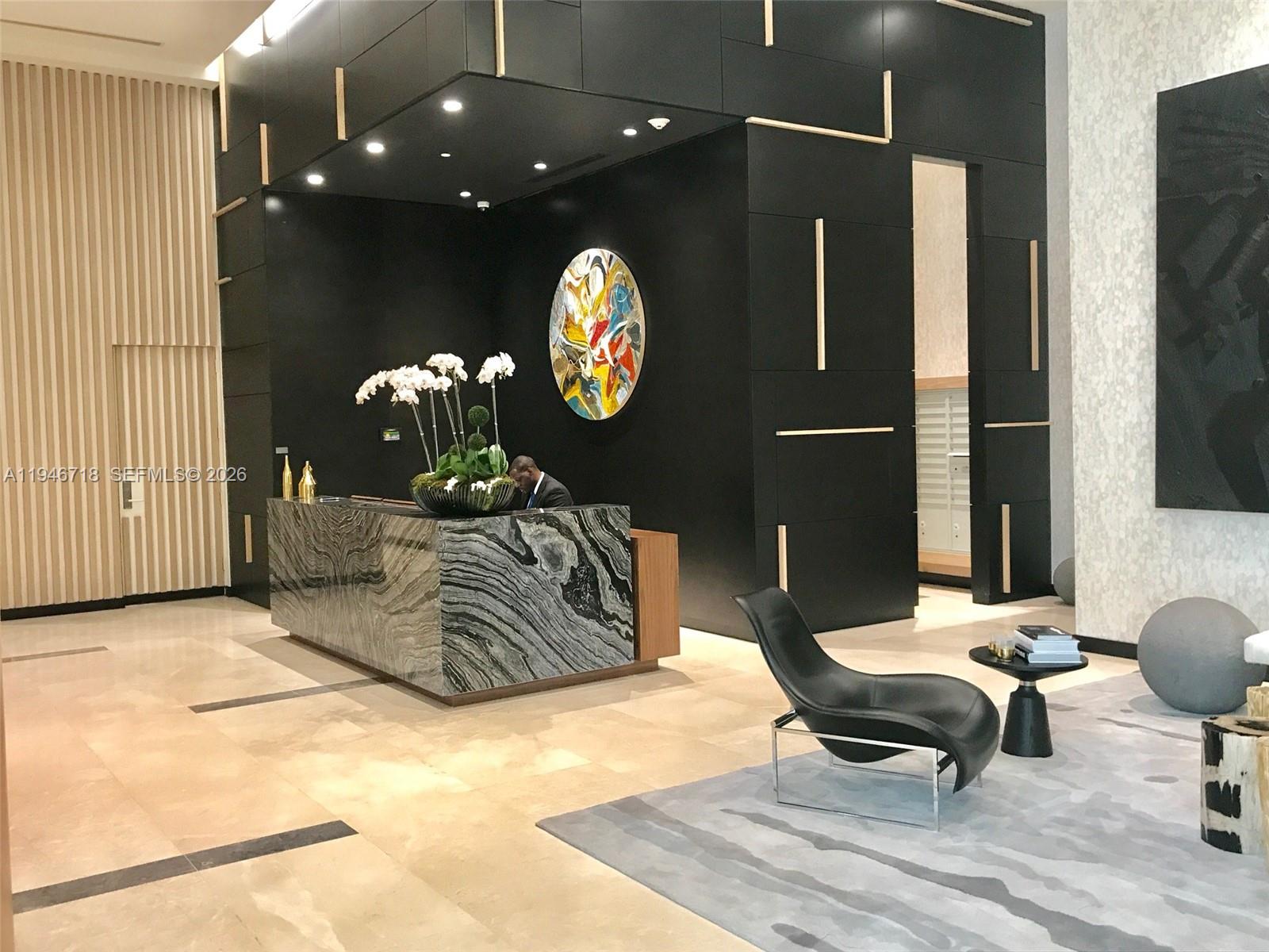 55 Southwest 9th Street, Unit 2807 Miami, FL 33130 - Photo 2 of 20 a living room with furniture