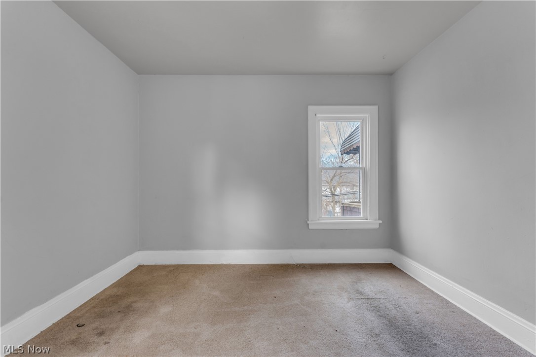860 Greyton Road Cleveland Heights, OH 44112 - Photo 24 of 31 Empty room featuring carpet