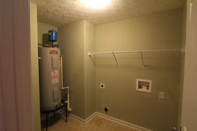 a bathroom with a shower and a sink