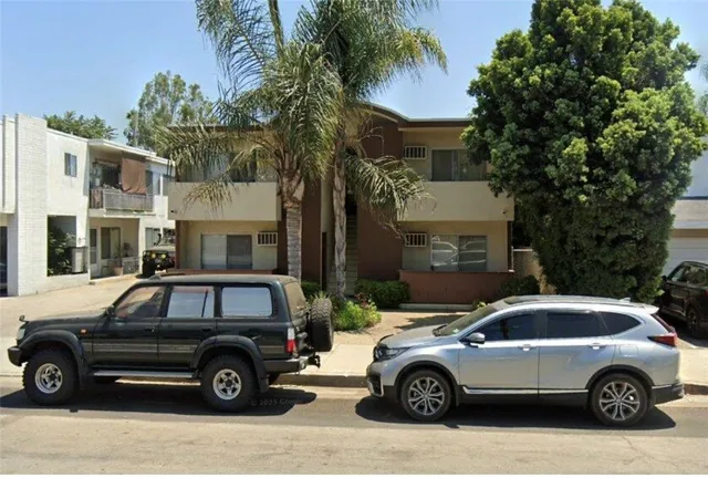a car parked in front of a house
