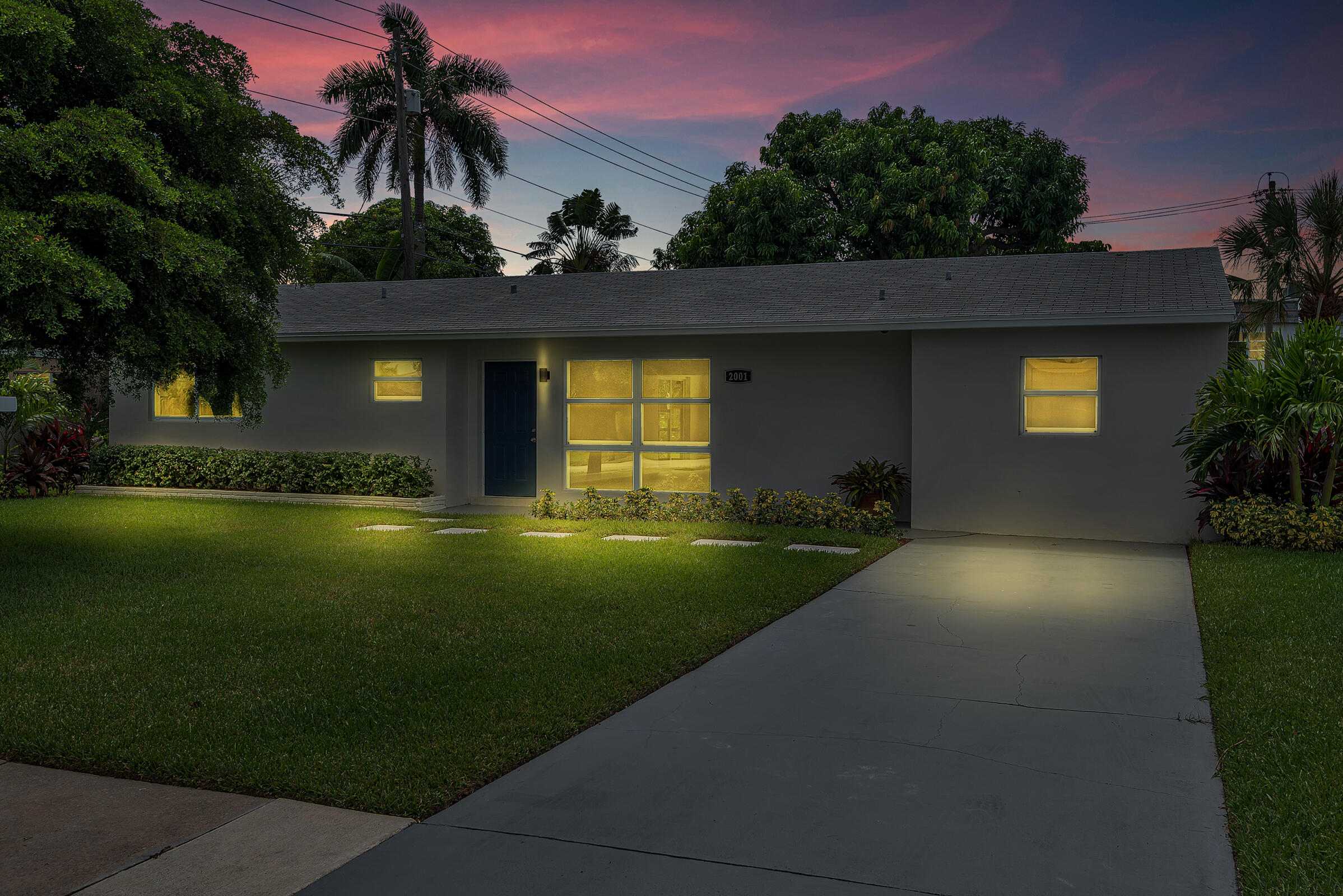 2001 Collier Avenue Lake Worth, FL 33461 - Photo 1 of 47 front