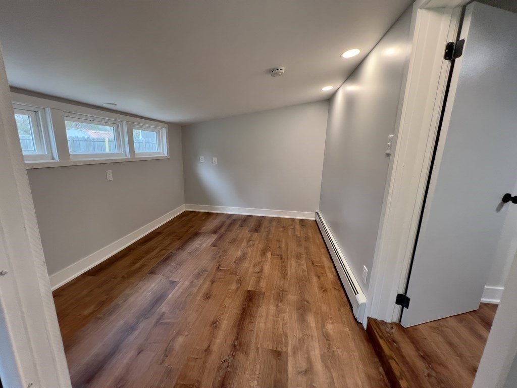 60 Corcoran Boulevard Springfield, MA 01118 - Photo 16 of 30 a view of wooden floor in a room