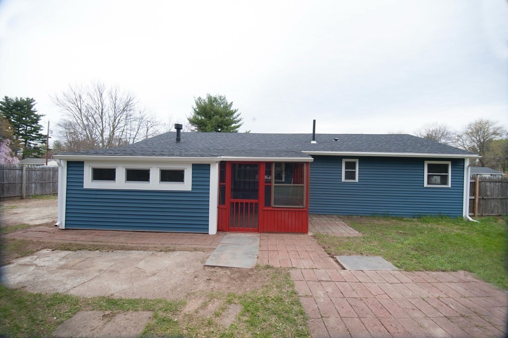 60 Corcoran Boulevard Springfield, MA 01118 - Photo 2 of 30 a front view of a house with a yard