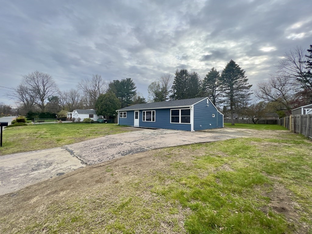 60 Corcoran Boulevard Springfield, MA 01118 - Photo 3 of 30 a front view of house with yard and green space