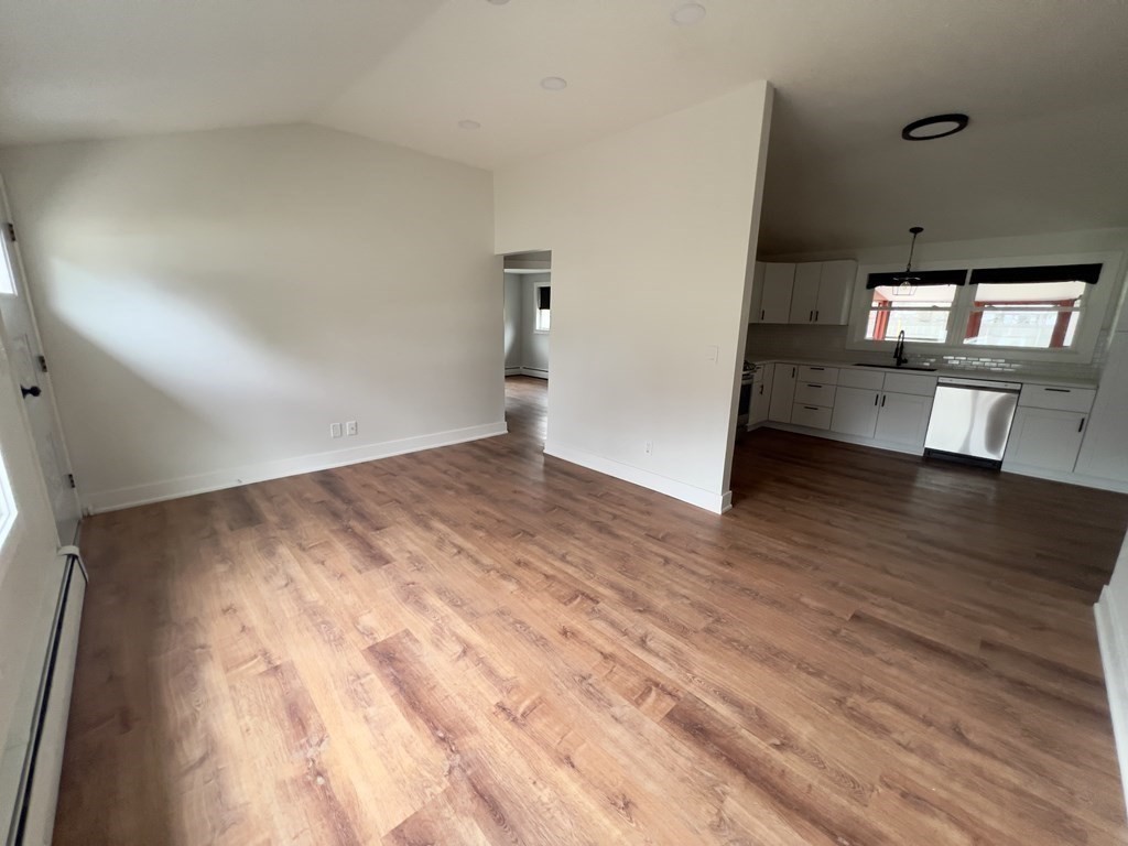 60 Corcoran Boulevard Springfield, MA 01118 - Photo 6 of 30 a view of empty room with wooden floor