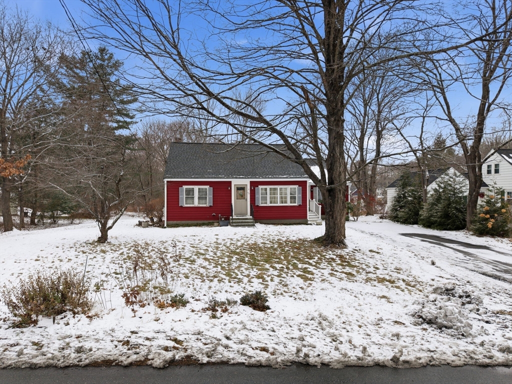 71 Liberty Street Acton, MA 01720 - Photo 13 of 13 a street sign covered with trees