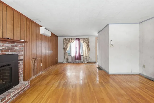 a view of entryway with wooden floor
