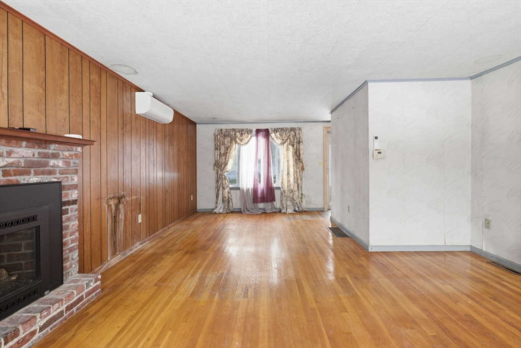71 Liberty Street Acton, MA 01720 - Photo 4 of 13 a view of entryway with wooden floor