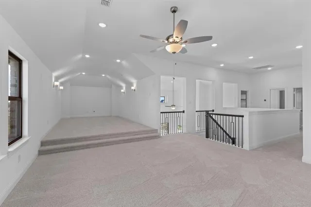 a view of a hallway with chandelier