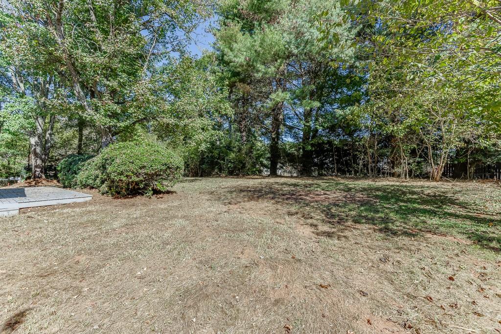 5837 Meadow View Lane Flowery Branch, GA 30542 - Photo 2 of 47 a view of outdoor space with trees all around