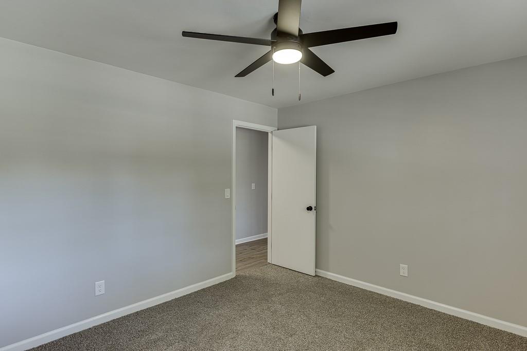 5837 Meadow View Lane Flowery Branch, GA 30542 - Photo 27 of 47 wooden floor in an empty room
