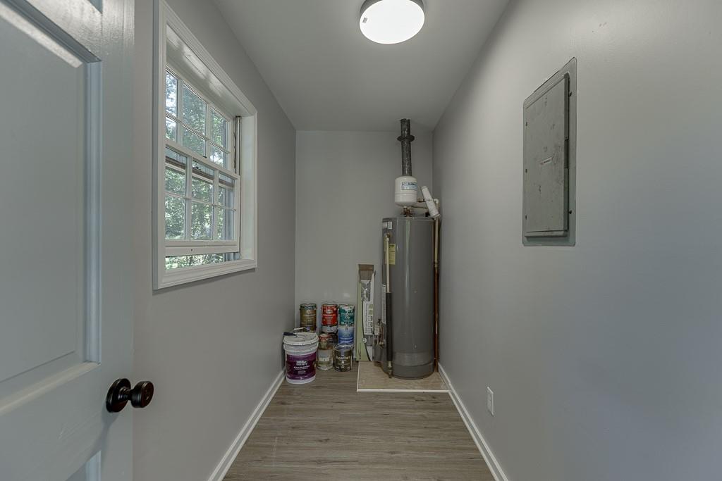 5837 Meadow View Lane Flowery Branch, GA 30542 - Photo 33 of 47 a view of hallway with windows and a chandelier