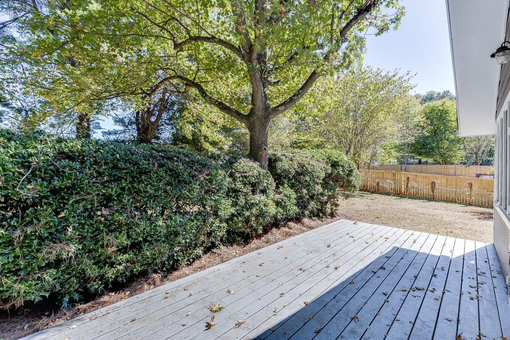 5837 Meadow View Lane Flowery Branch, GA 30542 - Photo 37 of 47 a backyard of a house with lots of green space